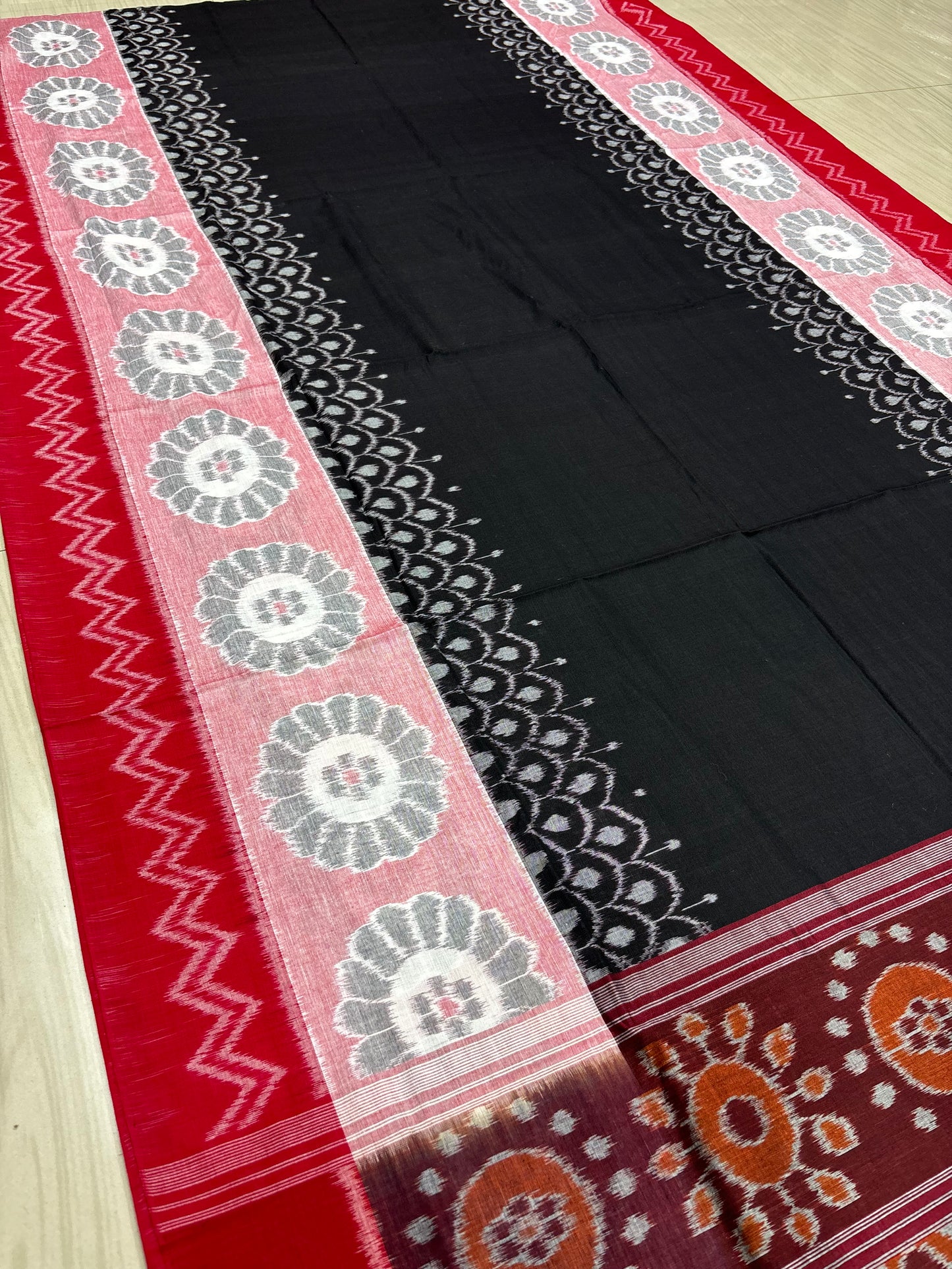 Black with red scot flowers cotton saree