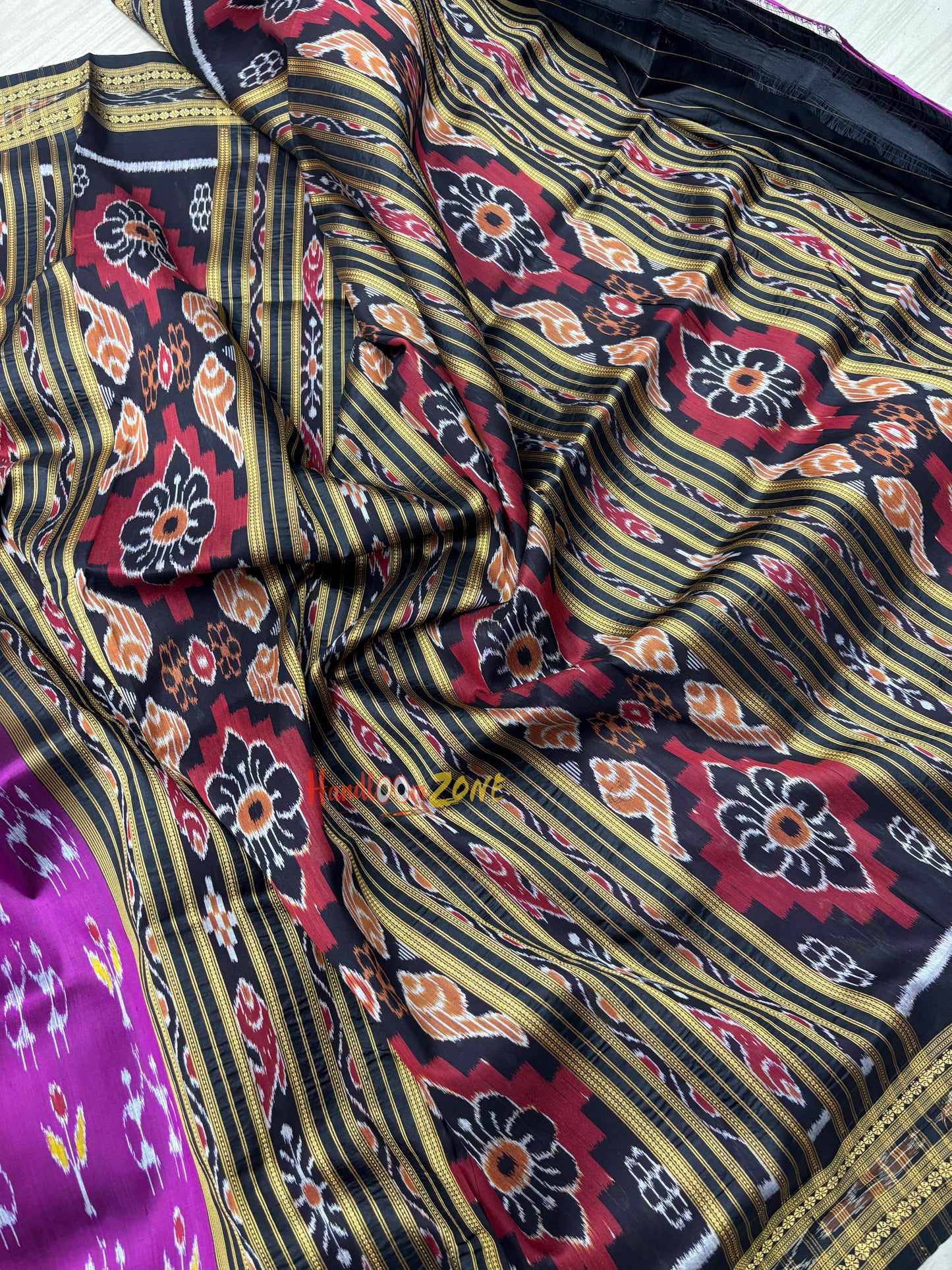 Traibal with flowers khandua silk saree