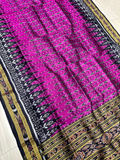 Rani with black Khandua pata saree