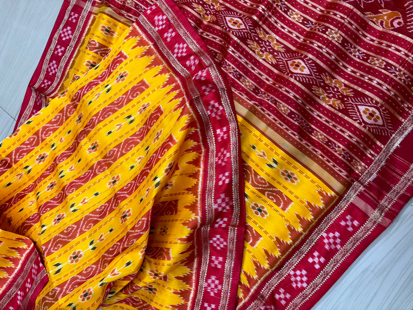 Yellow with red Khandua pata saree