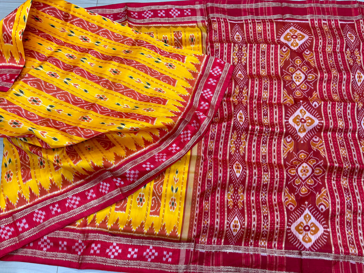 Yellow with red Khandua pata saree
