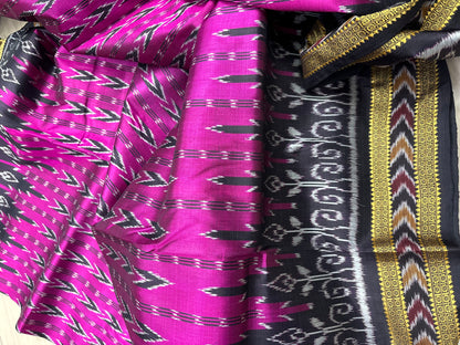 Rani with black Khandua pata saree