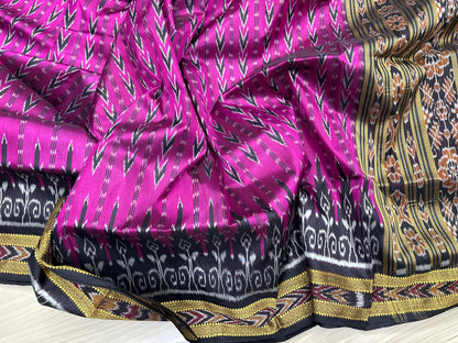 Rani with black Khandua pata saree