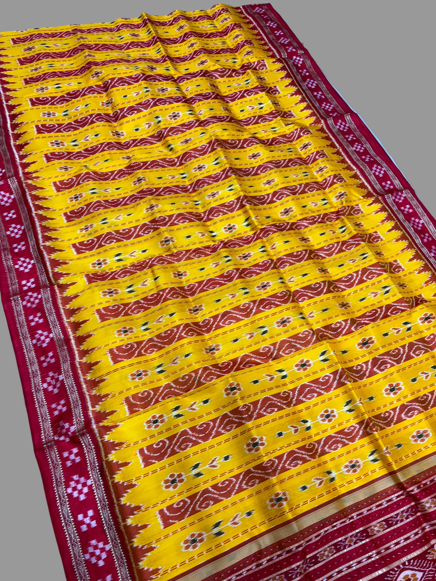 Yellow with red Khandua pata saree